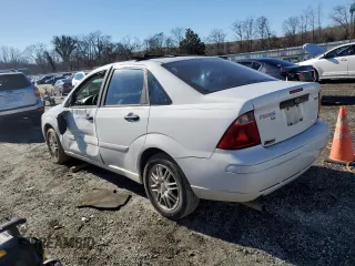 2005 Ford Focus S with VIN 1FAFP34N15W247101, listed as a Copart auction lot 85080834 with 232,068 mi miles and Salvage Title. Bid and sale history available at carsss.com. Image 2.