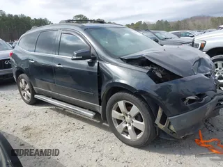 2011 Chevrolet Traverse LTZ z VIN 1GNKRLED1BJ382393, wystawiony jako IAAI lot #41718927 z przebiegiem 247 284 mil mil oraz . Historia ofert i sprzedaży dostępna na DreamBid. Obrazek 1.