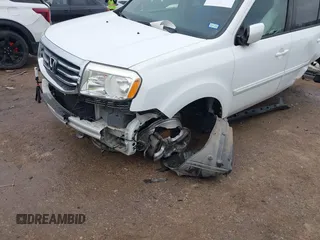 2012 Honda Pilot EX-L with VIN 5FNYF3H51CB012098, listed as a IAAI auction lot 41521214 with 157,701 mi miles. Bid and sale history available at carsss.com. Image 6.