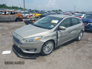 2015 Ford Focus Titanium с VIN 1FADP3N2XFL367753, выставлен на аукционе IAAI как лот 42695722 с пробегом 26 565 миль миль и . История ставок и продаж доступна на DreamBid. Изображение 2.