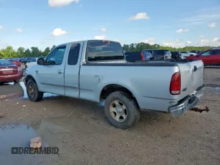2000 Ford F-150 XL с VIN 1FTRX17L6YKB45245, выставлен на аукционе Copart как лот 62365195 с пробегом 306 210 миль миль и Списание • Salvage title. История ставок и продаж доступна на DreamBid. Изображение 2.