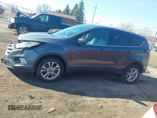 2017 Ford Escape SE with VIN 1FMCU0GD0HUB80123, listed as a IAAI auction lot 41895514 with 61,680 mi miles and . Bid and sale history available at DreamBid. Image 14.