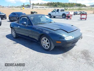 1996 Mazda MX-5 Miata z VIN JM1NA3536T0711164, wystawiony jako IAAI lot #41725201 z przebiegiem 151 710 mil mil oraz . Historia ofert i sprzedaży dostępna na DreamBid. Obrazek 1.