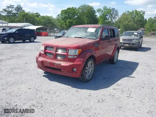 2007 Dodge Nitro R/T with VIN 1D8GU58667W669410, listed as a IAAI auction lot 42077739 with 107,613 mi miles. Bid and sale history available at carsss.com. Image 2.