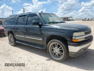 2005 Chevrolet Suburban LT with VIN 3GNEC16Z95G257855, listed as a Copart auction lot 61812335 with 188,511 mi miles and Salvage title. Bid and sale history available at DreamBid. Image 4.
