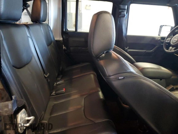 2017 Jeep Wrangler Unlimited Sahara with VIN 1C4HJWEG9HL639562, listed as a Copart auction lot 55074445 with 112,225 mi miles and Salvage title. Bid and sale history available at DreamBid. Image 11.