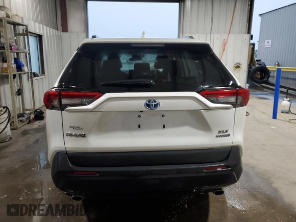 2021 Toyota RAV4 Hybrid LE with VIN 4T3B6RFV0MU050204, listed as a Copart auction lot 50768195 with 76,508 mi miles and Salvage Title. Bid and sale history available at carsss.com. Image 6.