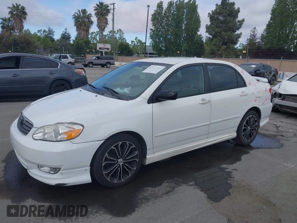 2004 Toyota Corolla CE with VIN JTDBR32E440052035, listed as a IAAI auction lot 42218301 with 299,999 mi miles. Bid and sale history available at carsss.com. Image 2.