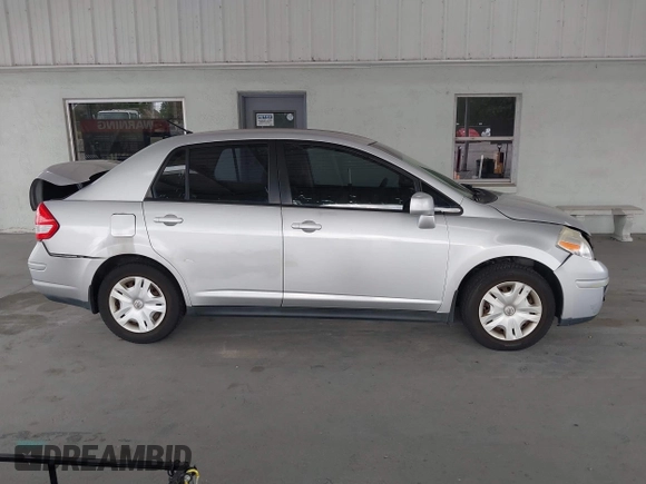 2011 Nissan Versa S with VIN 3N1BC1APXBL460003, listed as a IAAI auction lot 42206242 with 113,099 mi miles and . Bid and sale history available at DreamBid. Image 13.