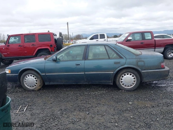 1993 Cadillac Seville Touring STS with VIN 1G6KY5290PU821230, listed as a IAAI auction lot 41778659 with NaN miles. Bid and sale history available at carsss.com. Image 14.