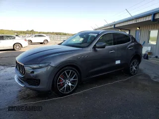 2017 Maserati Levante S z VIN ZN661YUS1HX225966, wystawiony jako Copart lot #52089285 z przebiegiem 118 690 mil mil oraz Szkoda całkowita • Salvage title. Historia ofert i sprzedaży dostępna na DreamBid. Obrazek 1.