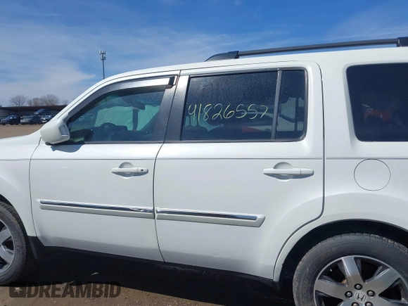 2013 Honda Pilot Touring with VIN 5FNYF3H9XDB006353, listed as a IAAI auction lot 41826557 with 174,552 mi miles and . Bid and sale history available at DreamBid. Image 15.