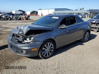 2012 Volkswagen Eos Komfort with VIN WVWBW7AH0CV002763, listed as a Copart auction lot 85942204 with 123,880 mi miles and Salvage Title. Bid and sale history available at DreamBid. Image 1.