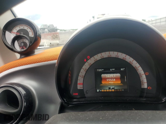 2016 Smart fortwo Passion with VIN WMEFJ5DA0GK060576, listed as a Copart auction lot 55641565 with 99,558 mi miles and Salvage title. Bid and sale history available at DreamBid. Image 9.