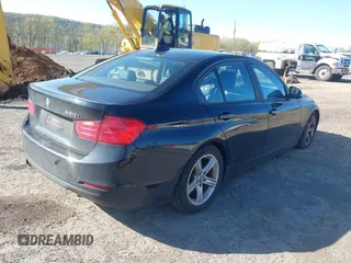 2015 BMW 3 Series 320i with VIN WBA3B1G55FNT04870, listed as a IAAI auction lot 42141211 with 249,720 mi miles. Bid and sale history available at carsss.com. Image 4.