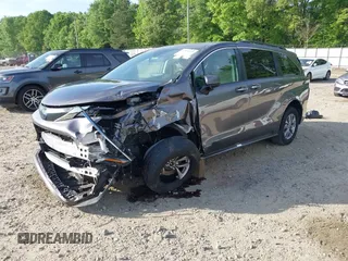 2021 Toyota Sienna XLE z VIN 5TDYRKEC0MS007394, wystawiony jako IAAI lot #42080004 z przebiegiem 75 553 mil mil oraz . Historia ofert i sprzedaży dostępna na DreamBid. Obrazek 2.