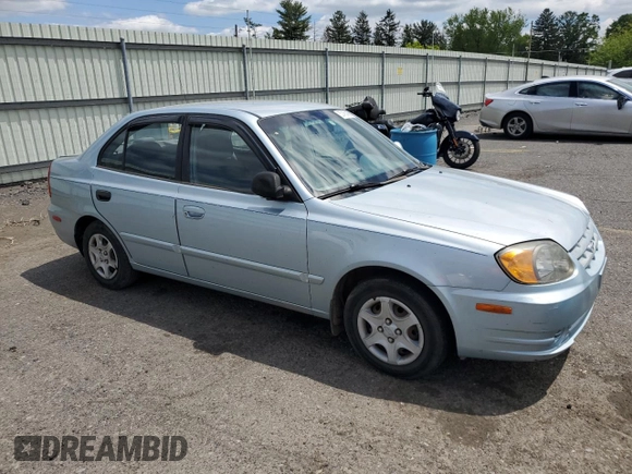 2004 Hyundai Accent GL z VIN KMHCG45C94U574027, wystawiony jako Copart lot #57463905 z przebiegiem 139 595 mil mil oraz Szkoda całkowita • Salvage title. Historia ofert i sprzedaży dostępna na DreamBid. Obrazek 4.