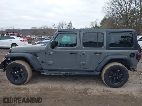 2021 Jeep Wrangler Unlimited Sport Altitude with VIN 1C4HJXDG1MW603784, listed as a IAAI auction lot 41509231 with 102,567 mi miles and . Bid and sale history available at DreamBid. Image 15.