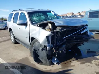 2013 Chevrolet Tahoe LT with VIN 1GNSKBE01DR157083, listed as a IAAI auction lot 41759189 with 153,403 mi miles and . Bid and sale history available at DreamBid. Image 1.