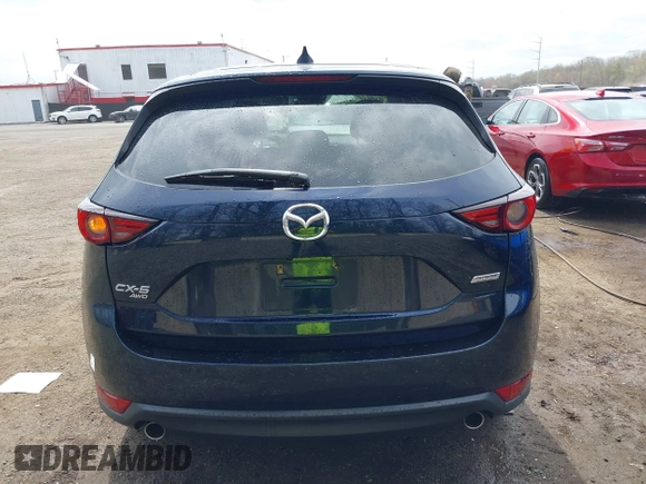 2018 Mazda CX-5 Grand Touring with VIN JM3KFBDM3J0377866, listed as a IAAI auction lot 41947014 with 70,446 mi miles. Bid and sale history available at carsss.com. Image 16.