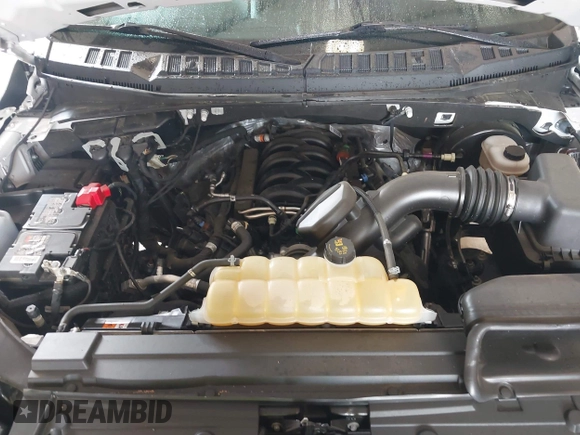 2020 Ford F-150 XL with VIN 1FTMF1C59LFC62890, listed as a IAAI auction lot 42430422 with 68,809 mi miles and . Bid and sale history available at DreamBid. Image 10.
