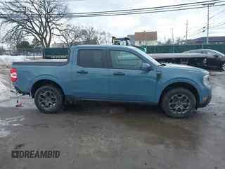 2022 Ford Maverick XL z VIN 3FTTW8E31NRA47140, wystawiony jako IAAI lot #41684097 z przebiegiem 39 225 mil mil oraz . Historia ofert i sprzedaży dostępna na DreamBid. Obrazek 14.