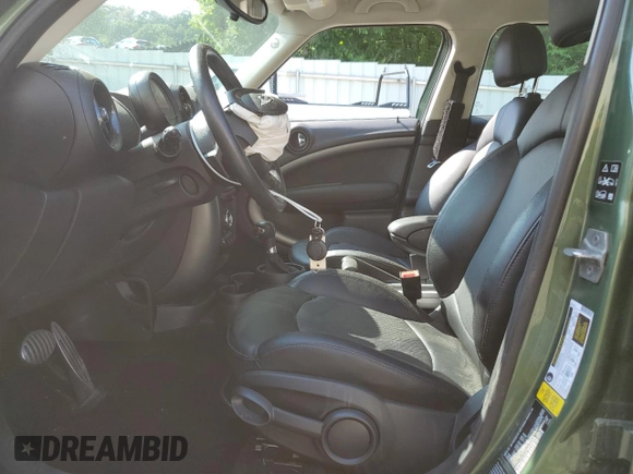 2015 MINI Countryman S with VIN WMWZC5C53FWP49039, listed as a Copart auction lot 60200335 with Not provided miles and Salvage title. Bid and sale history available at DreamBid. Image 7.