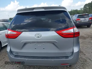2015 Toyota Sienna XLE with VIN 5TDYK3DC7FS659864, listed as a IAAI auction lot 41958112 with 121,257 mi miles and . Bid and sale history available at DreamBid. Image 16.