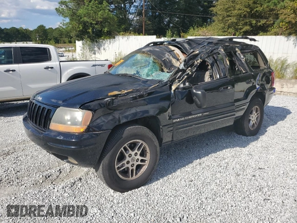 2000 Jeep Grand Cherokee Laredo with VIN 1J4G258S5YC193875, listed as a Copart auction lot 74731704 with Not provided miles and Salvage title. Bid and sale history available at DreamBid. Image 1.