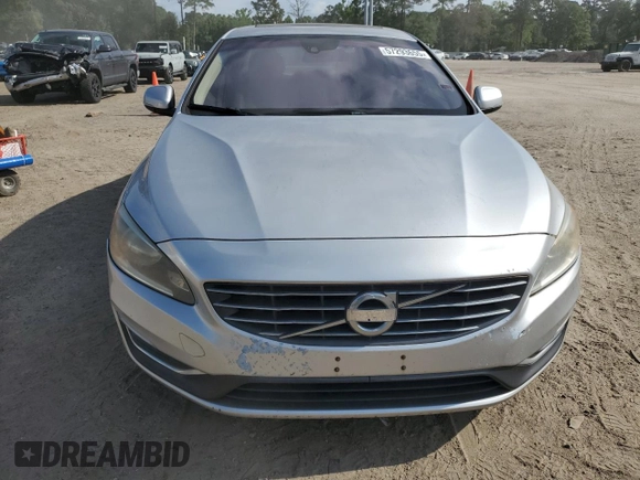 2014 Volvo S60 T5 z VIN YV1612FS3E2295726, wystawiony jako Copart lot #57293655 z przebiegiem 100 670 mil mil oraz Czysty tytuł • Clean title. Historia ofert i sprzedaży dostępna na DreamBid. Obrazek 5.