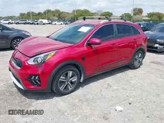 2020 Kia Niro LX with VIN KNDCB3LCXL5436098, listed as a IAAI auction lot 42037995 with 22,080 mi miles and . Bid and sale history available at DreamBid. Image 2.