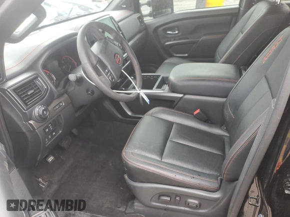 2024 Nissan Titan Pro-4X with VIN 1N6AA1ED7RN106896, listed as a Copart auction lot 55622215 with 16,155 mi miles and Salvage title. Bid and sale history available at DreamBid. Image 7.