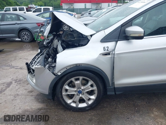 2013 Ford Escape SEL z VIN 1FMCU9H97DUA34665, wystawiony jako IAAI lot #42258567 z przebiegiem 174 227 mil mil oraz . Historia ofert i sprzedaży dostępna na DreamBid. Obrazek 18.