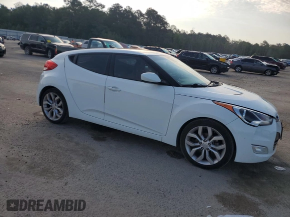 2013 Hyundai Veloster w/Gray Int with VIN KMHTC6ADXDU130886, listed as a Copart auction lot 57478095 with 130,008 mi miles and Salvage title. Bid and sale history available at DreamBid. Image 4.