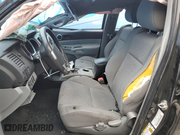 2014 Toyota Tacoma PreRunner with VIN 3TMJU4GN0EM170736, listed as a Copart auction lot 61993545 with 194,801 mi miles and Salvage title. Bid and sale history available at DreamBid. Image 7.
