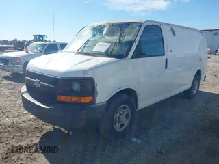 2005 Chevrolet Express Cargo with VIN 1GCFG15X351206710, listed as a IAAI auction lot 40946502 with 242,421 mi miles and . Bid and sale history available at DreamBid. Image 2.