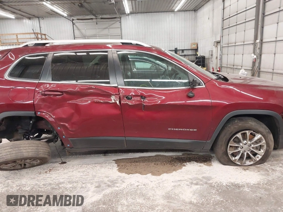 2019 Jeep Cherokee Latitude Plus with VIN 1C4PJMLX0KD185576, listed as a IAAI auction lot 40929611 with 105,546 mi miles and . Bid and sale history available at DreamBid. Image 14.