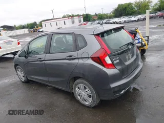 2019 Honda Fit LX with VIN 3HGGK5H40KM735754, listed as a IAAI auction lot 42308818 with 78,504 mi miles and . Bid and sale history available at DreamBid. Image 3.