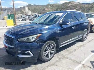 2016 Infiniti QX60 with VIN 5N1AL0MNXGC520860, listed as a IAAI auction lot 41955662 with 165,716 mi miles. Bid and sale history available at carsss.com. Image 17.