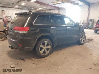 2014 Jeep Grand Cherokee Limited with VIN 1C4RJFBG6EC518170, listed as a IAAI auction lot 41506695 with 156,537 mi miles. Bid and sale history available at carsss.com. Image 4.