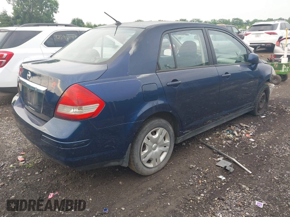 2010 Nissan Versa S with VIN 3N1BC1AP5AL403111, listed as a IAAI auction lot 42594484 with 152,453 mi miles and . Bid and sale history available at DreamBid. Image 4.