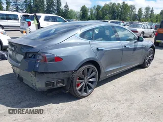 2013 Tesla Model S Performance with VIN 5YJSA1DP8DFP28644, listed as a IAAI auction lot 42641375 with 140,941 mi miles and . Bid and sale history available at DreamBid. Image 4.