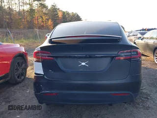 2020 Tesla Model X Long Range with VIN 5YJXCDE28LF298553, listed as a IAAI auction lot 40863184 with 54,031 mi miles and . Bid and sale history available at DreamBid. Image 16.