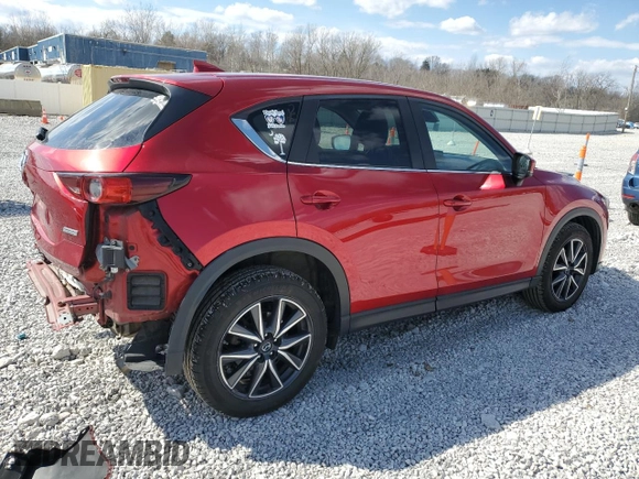 2018 Mazda CX-5 Touring with VIN JM3KFBCM4J0311022, listed as a Copart auction lot 50638485 with 85,927 mi miles and Salvage Title. Bid and sale history available at DreamBid. Image 3.
