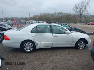 2002 Lexus LS 430 z VIN JTHBN30F020052519, wystawiony jako IAAI lot #41920819 z przebiegiem 254 280 mil mil oraz . Historia ofert i sprzedaży dostępna na DreamBid. Obrazek 13.