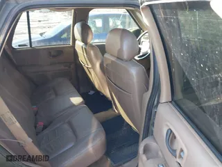 2001 Oldsmobile Bravada with VIN 1GHDT13W312184767, listed as a IAAI auction lot 41347993 with 130,306 mi miles. Bid and sale history available at carsss.com. Image 8.