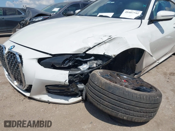 2022 BMW 4 Series 430i with VIN WBA53AP04NCJ83883, listed as a IAAI auction lot 40407741 with Not Provided miles and . Bid and sale history available at carsss.com. Image 6.
