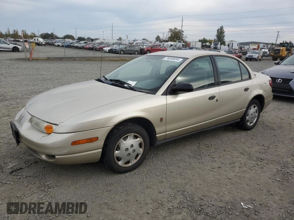 2001 Saturn SL z VIN 1G8ZH52831Z348124, wystawiony jako Copart lot #76058854 z przebiegiem 191 465 mil mil oraz Szkoda całkowita • Salvage title. Historia ofert i sprzedaży dostępna na DreamBid. Obrazek 1.
