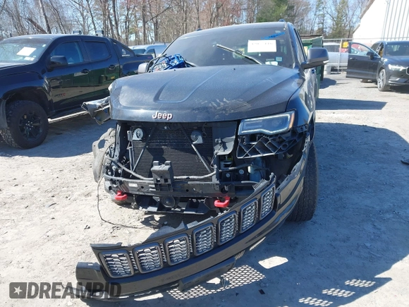 2017 Jeep Grand Cherokee Trailhawk с VIN 1C4RJFLGXHC670469, выставлен на аукционе IAAI как лот 42055116 с пробегом 99 801 миль миль и . История ставок и продаж доступна на DreamBid. Изображение 6.