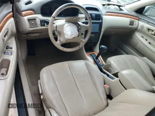 2002 Toyota Solara SE z VIN 2T1FF28P32C590841, wystawiony jako Copart lot #43753475 z przebiegiem 128 106 mil mil oraz Szkody całkowita. Historia ofert i sprzedaży dostępna na DreamBid. Obrazek 8.